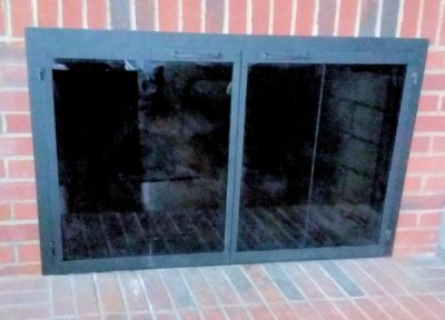 falmouth square black finish, magnet latch bi fold doors, smoked tempered glass, gate mesh spark screen, standard installation on brick 