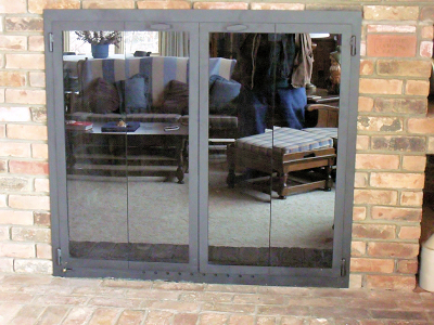 falmouth square all black finish vice bi fold doors, smoked tempered glass, standard installation on brick